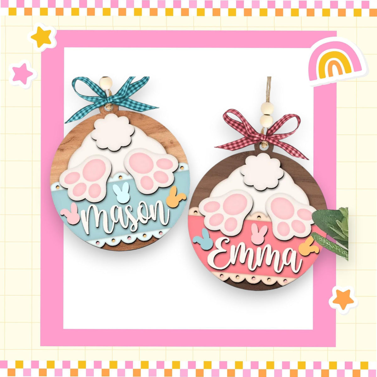 a picture of two wooden ornaments with a rainbow in the background