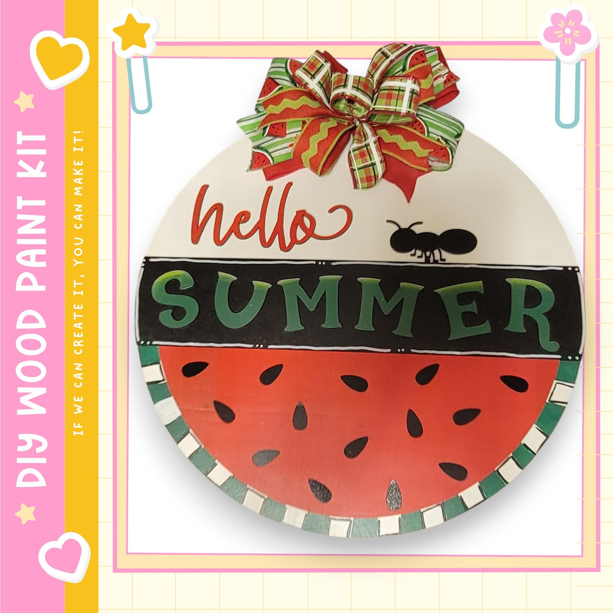 a decorative sign with the word "SUMMER" written on it, along with a bow and a heart-shaped design. The sign is surrounded by a colorful border and has a heart-shaped sticker on the left side.