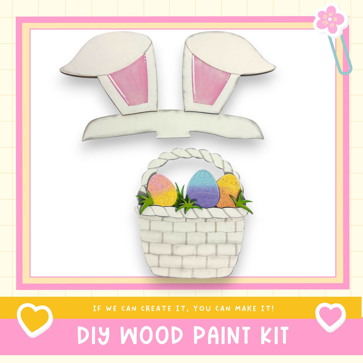 The image is a DIY wood paint kit featuring a basket filled with Easter eggs and a pair of bunny ears, set against a pink and white background.