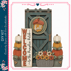 a wooden door with a welcome sign, surrounded by decorative elements such as pumpkins, flowers, and a heart-shaped sign.