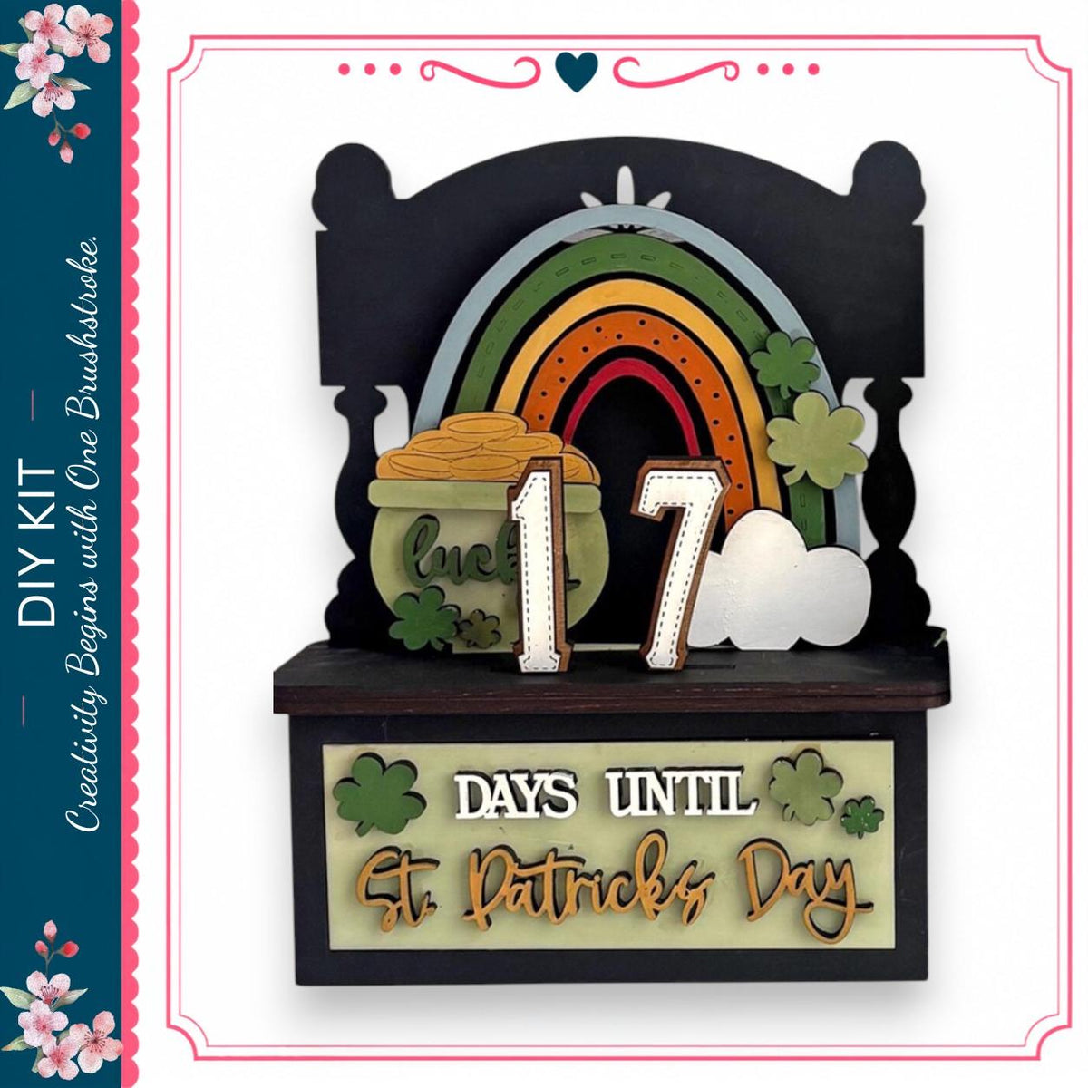 A DIY kit for creating a St. Patrick's Day-themed decoration, featuring a rainbow, shamrocks, and the number 17.