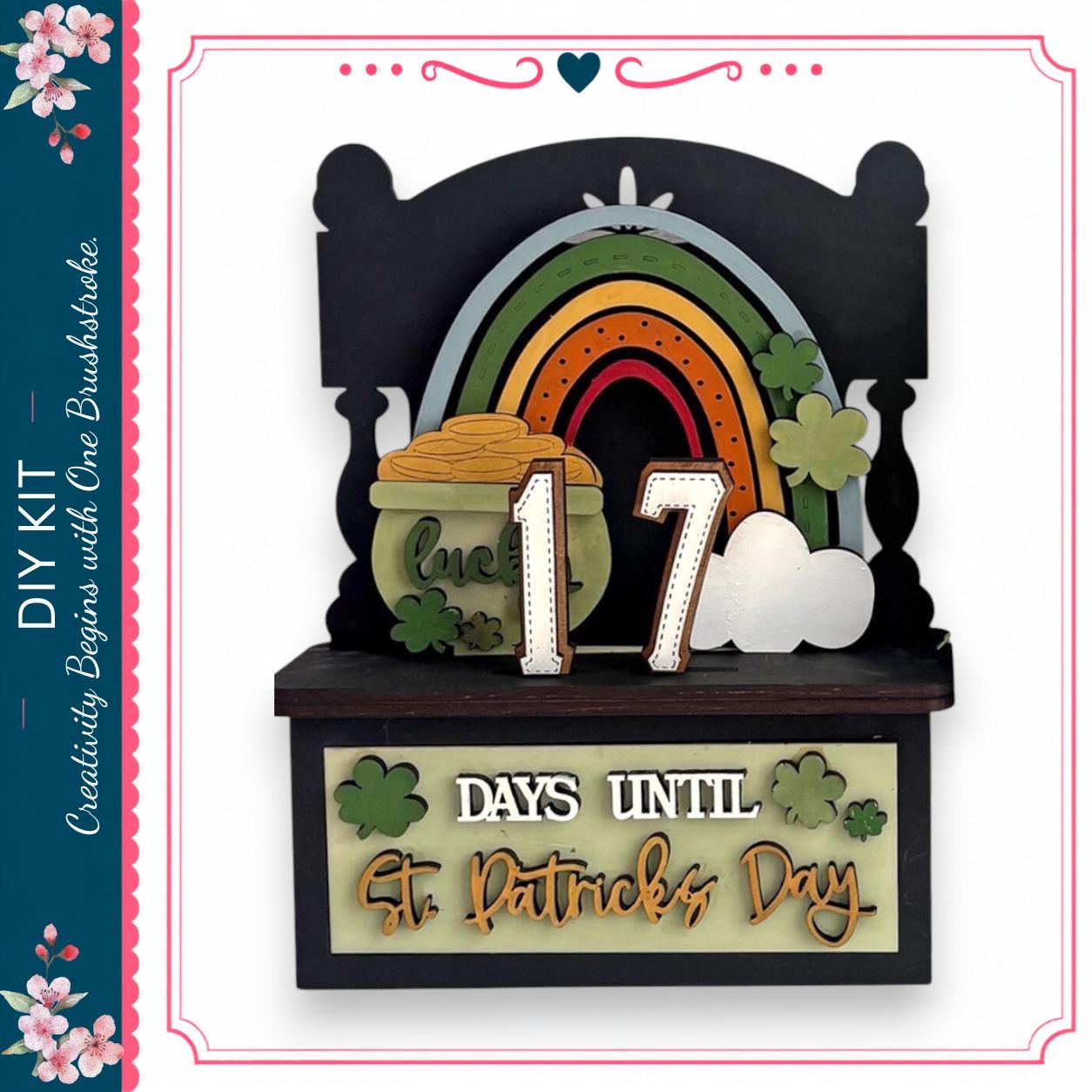 A DIY kit for creating a St. Patrick's Day-themed decoration, featuring a rainbow, shamrocks, and the number 17.