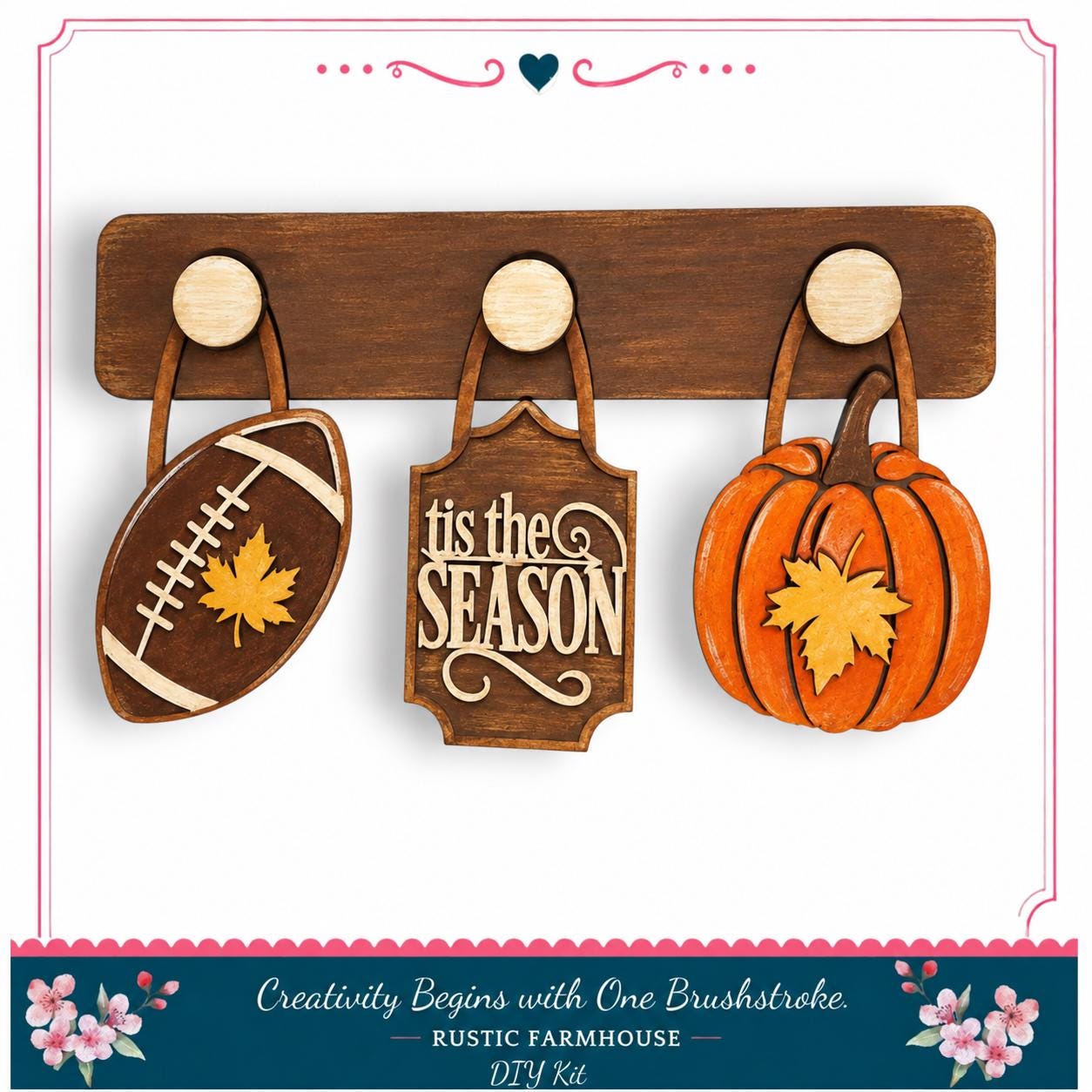 a rustic farmhouse DIY kit with a football, pumpkin, and leaf-shaped sign, all hanging on a wooden board.