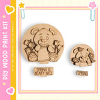 two wooden shapes, each depicting a bear, with the word "Spring" written below them.