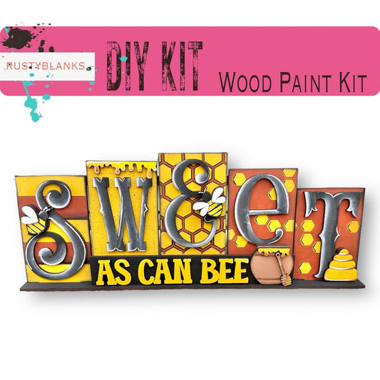 a wooden sign that says sweet as can bee