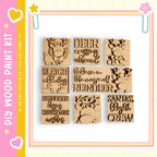 a collection of six wooden cutouts, each with a unique design and text, arranged in a grid pattern.