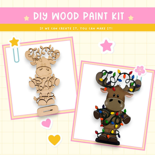 a wooden craft kit with two pictures of a moose