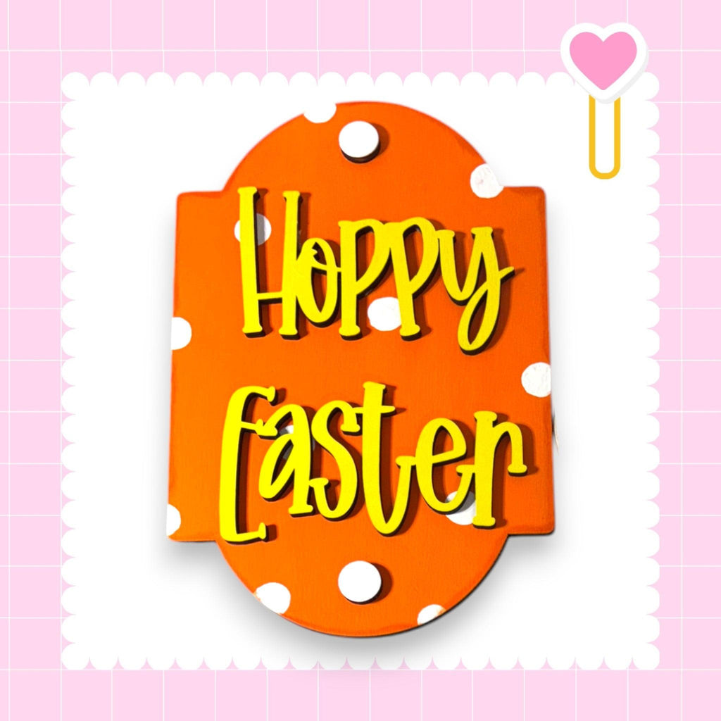 a sign that says happy easter on a pink background