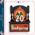 A decorative Thanksgiving-themed sign with a turkey silhouette and the number 20, indicating the number of days until Thanksgiving.