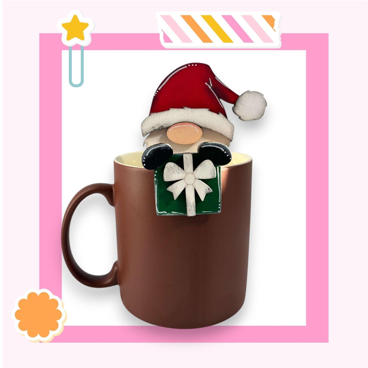 a coffee mug with a santa hat on top of it