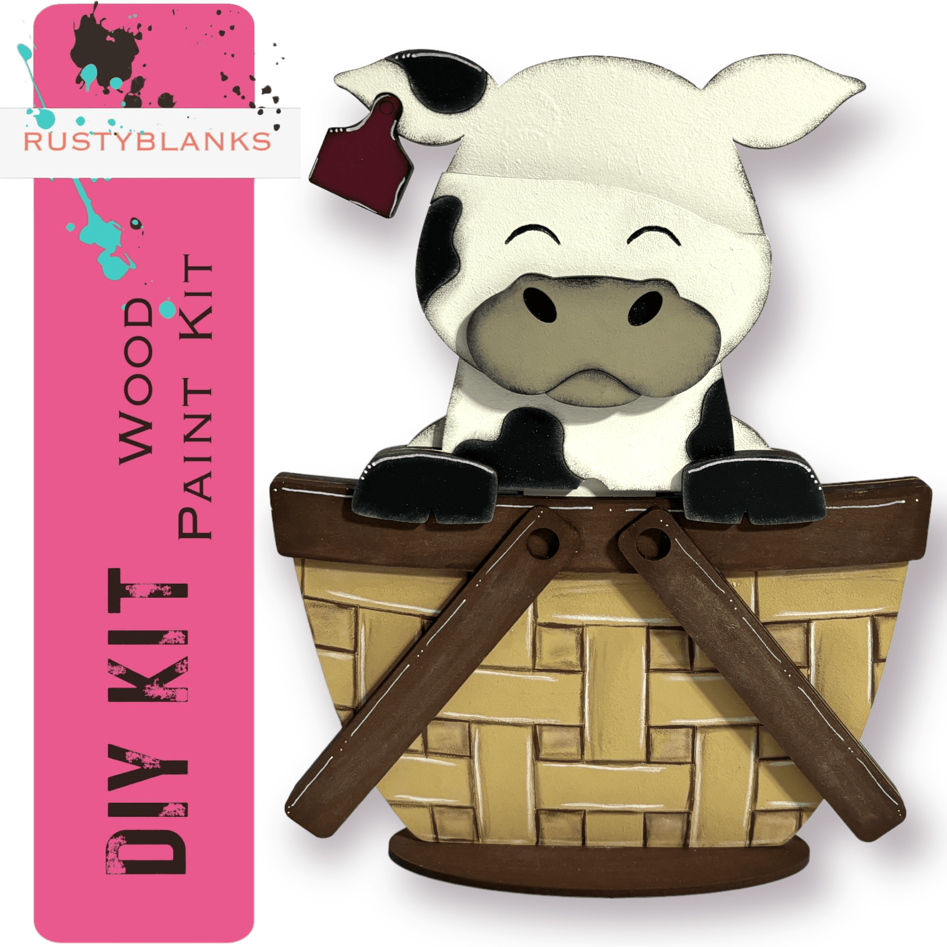 a paper cutout of a cow sitting in a basket