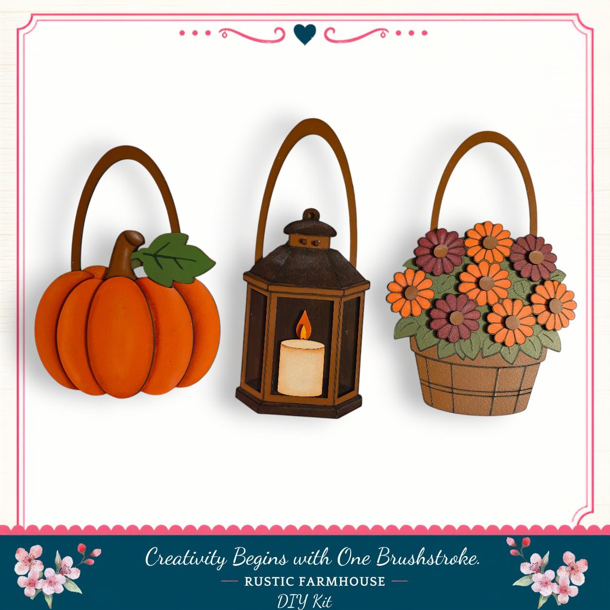 three decorative items: a pumpkin, a lantern, and a basket of flowers, arranged in a row.