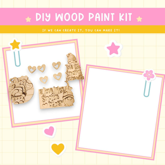 a wooden craft kit with hearts and a picture frame