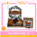 a wooden painting kit with a turkey and pumpkin