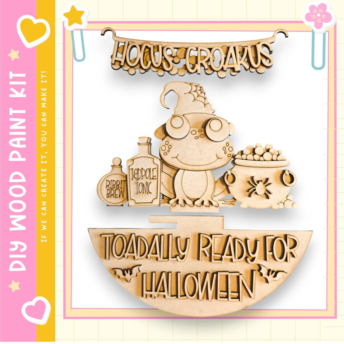 a Halloween-themed wooden craft kit, including a wooden frog, a wooden cauldron, and a wooden bottle labeled "Ribbit Brew". The kit is designed to be painted and used to create Halloween decorations.
