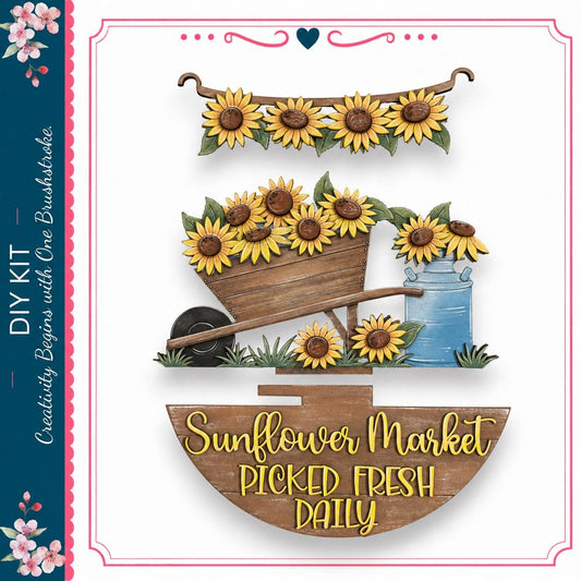 The image is a collage featuring a wooden wheelbarrow filled with yellow sunflowers, a blue bucket, and a wooden sign that reads "Sunflower Market Picked Fresh Daily".