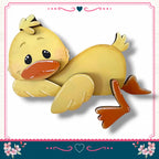 A cheerful yellow duck with orange beak and feet is depicted in a playful pose, surrounded by a decorative border with pink and blue floral elements.