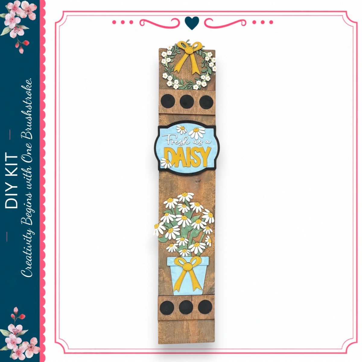 a wooden sign with a floral design and the word "DAISY" written on it.