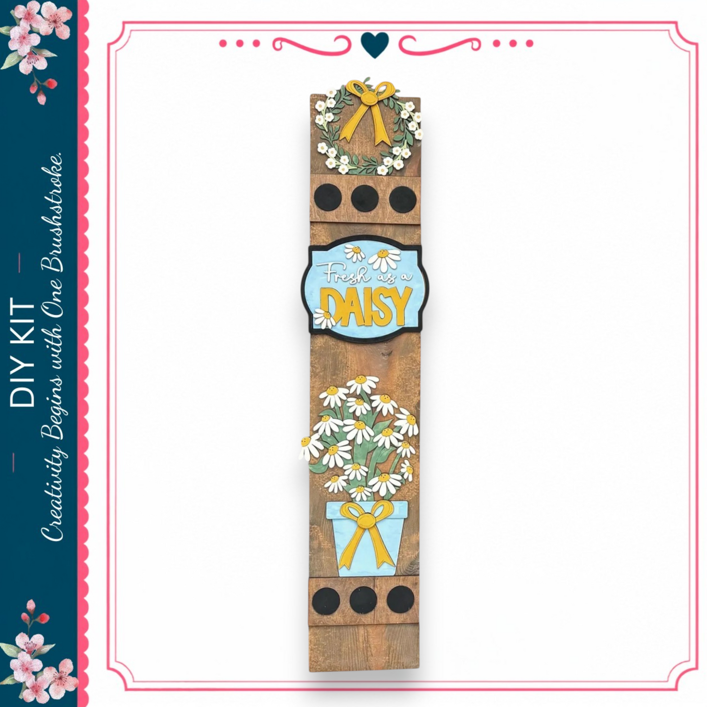a wooden sign with a floral design and the word "DAISY" written on it.