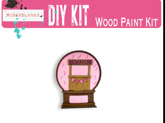 a wooden paint kit with a pink clock