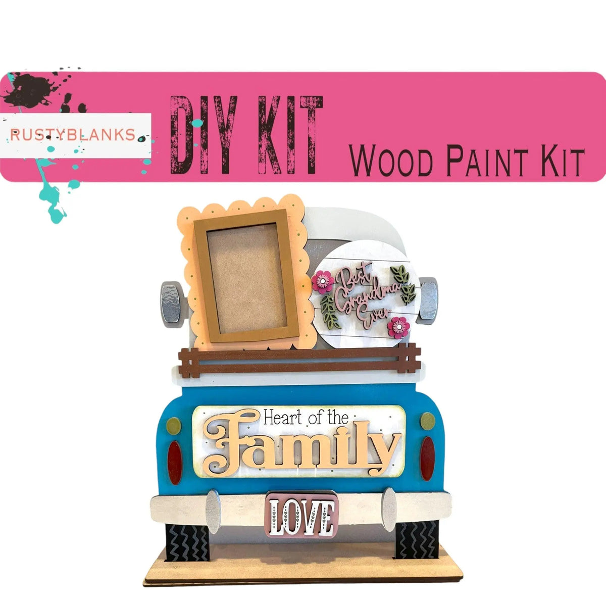 a blue truck with a picture frame on top of it