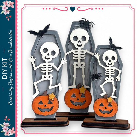 three wooden skeleton figures standing on top of carved pumpkins, creating a spooky Halloween display.