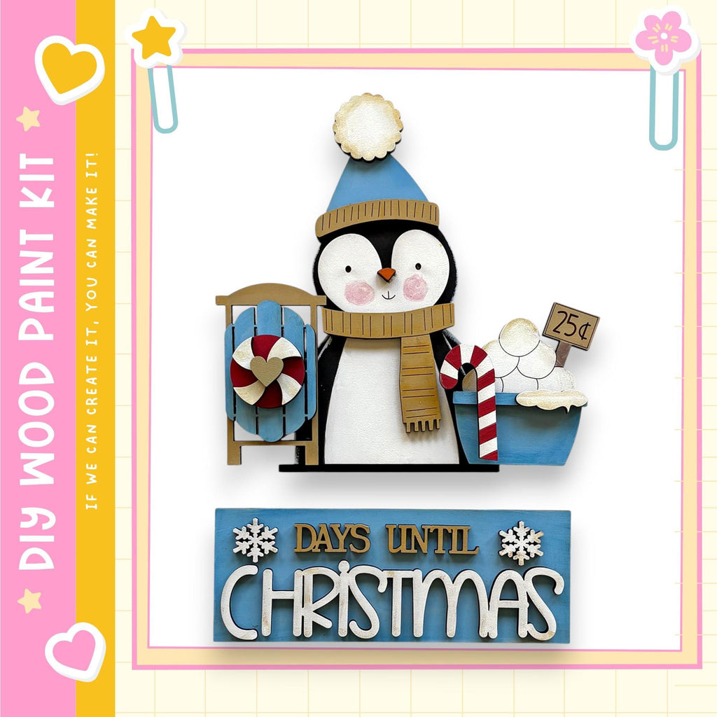 A wooden penguin figurine wearing a winter hat and scarf, holding a sign that says "DAYS UNTIL CHRISTMAS", is surrounded by various holiday-themed items such as a snowman, a candy cane, and a sign that says "25¢".