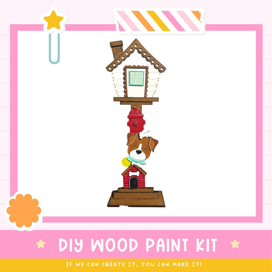 a DIY wood paint kit, which includes a wooden house and a dog. The kit is designed for people to create their own wooden house and dog figures.