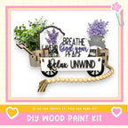 a wooden wagon filled with flowers and plants