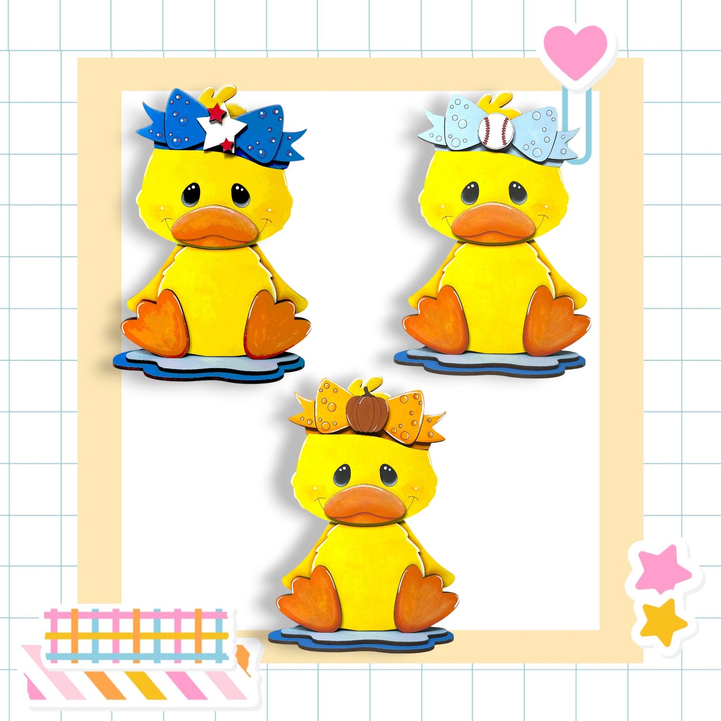 three yellow duck figures with different accessories, such as bows and baseballs, arranged in a frame.