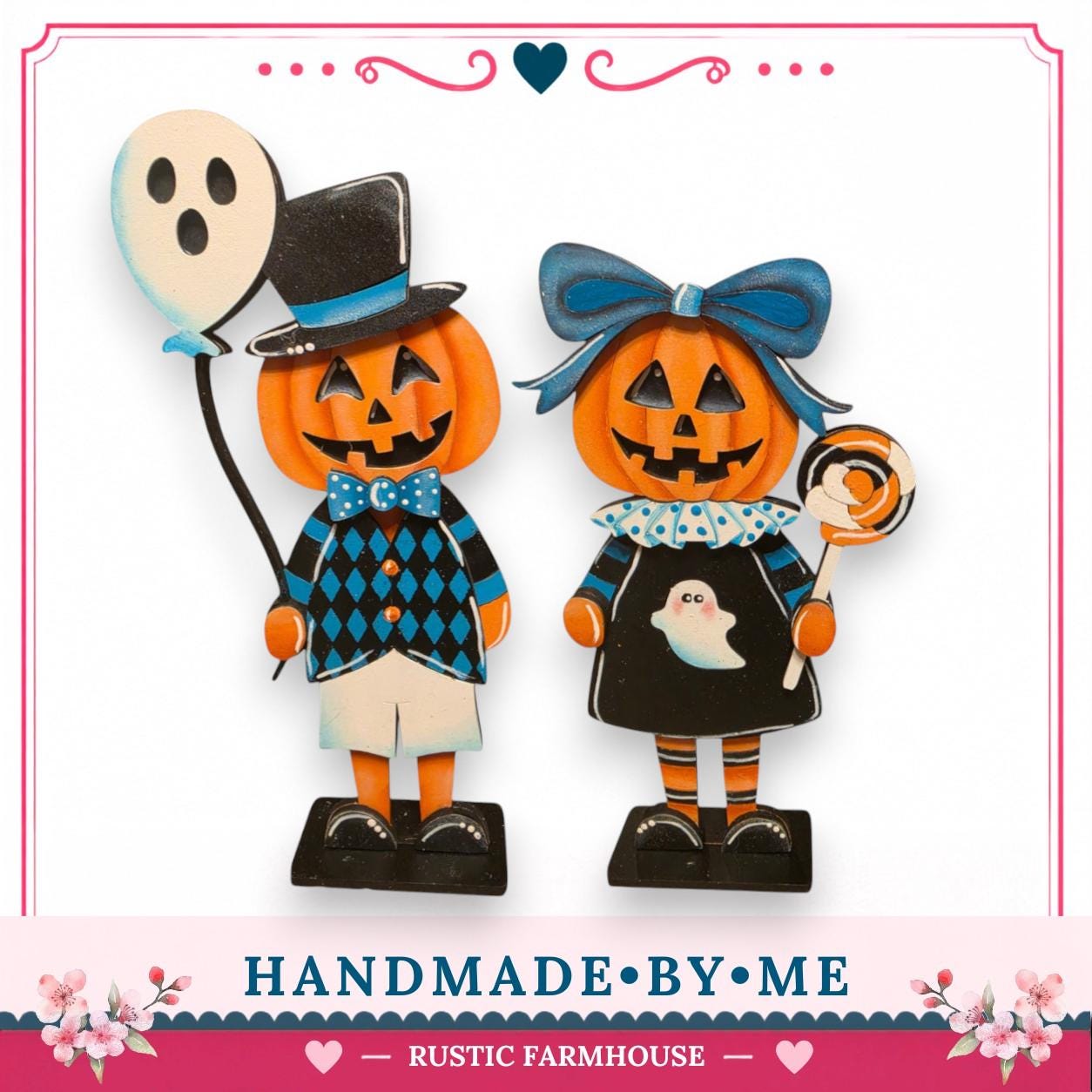two wooden Halloween figurines, a pumpkin and a ghost, standing together.