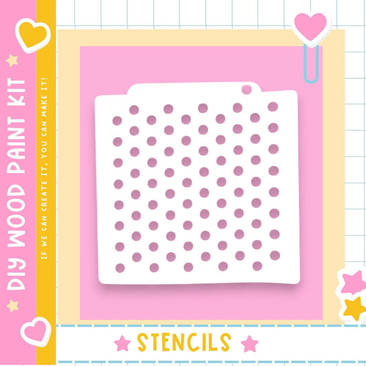 The image is a colorful and playful DIY paint kit featuring a white stencil with a pattern of pink dots on a pink background.