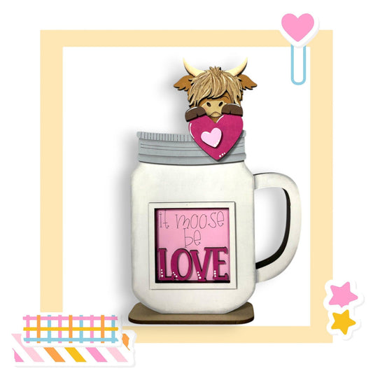 a picture of a mug with a cow on top of it