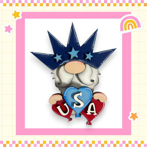 A whimsical illustration of a gnome wearing a crown and holding a heart with the letters "USA" on it, surrounded by stars and a rainbow.