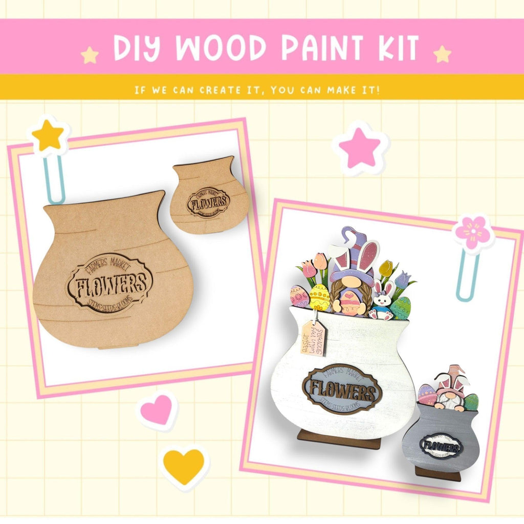 a wooden craft kit with flowers in a vase