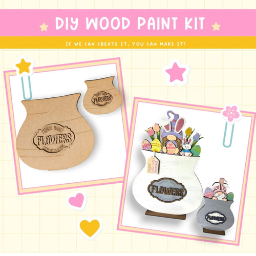 a wooden craft kit with flowers in a vase