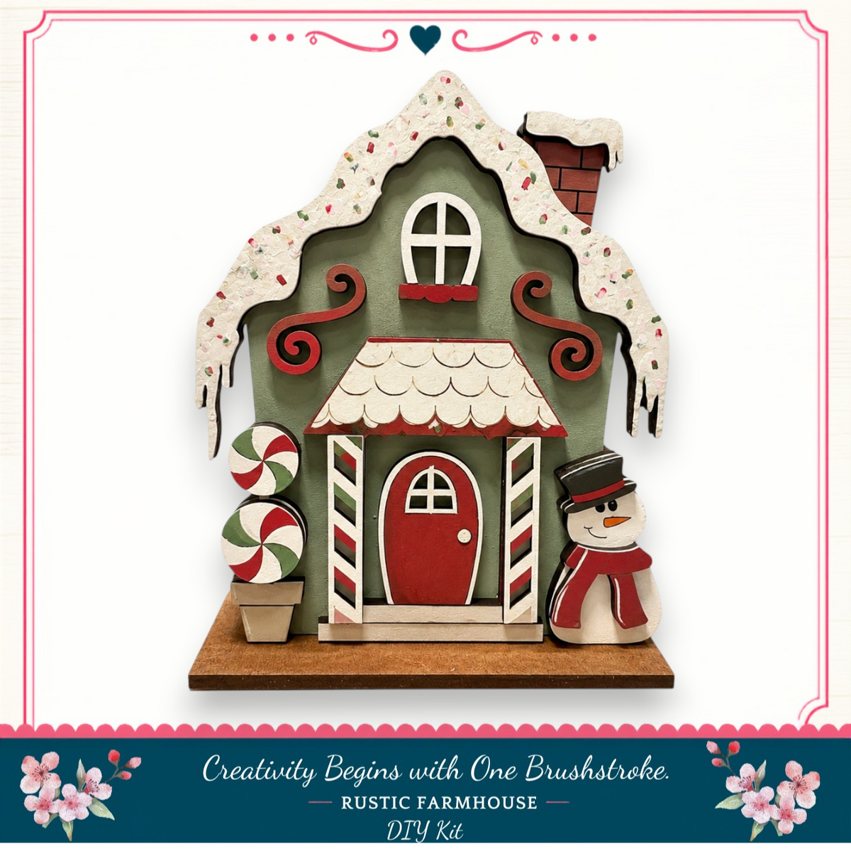 A wooden gingerbread house with a snowman and candy cane decorations, set against a white background.