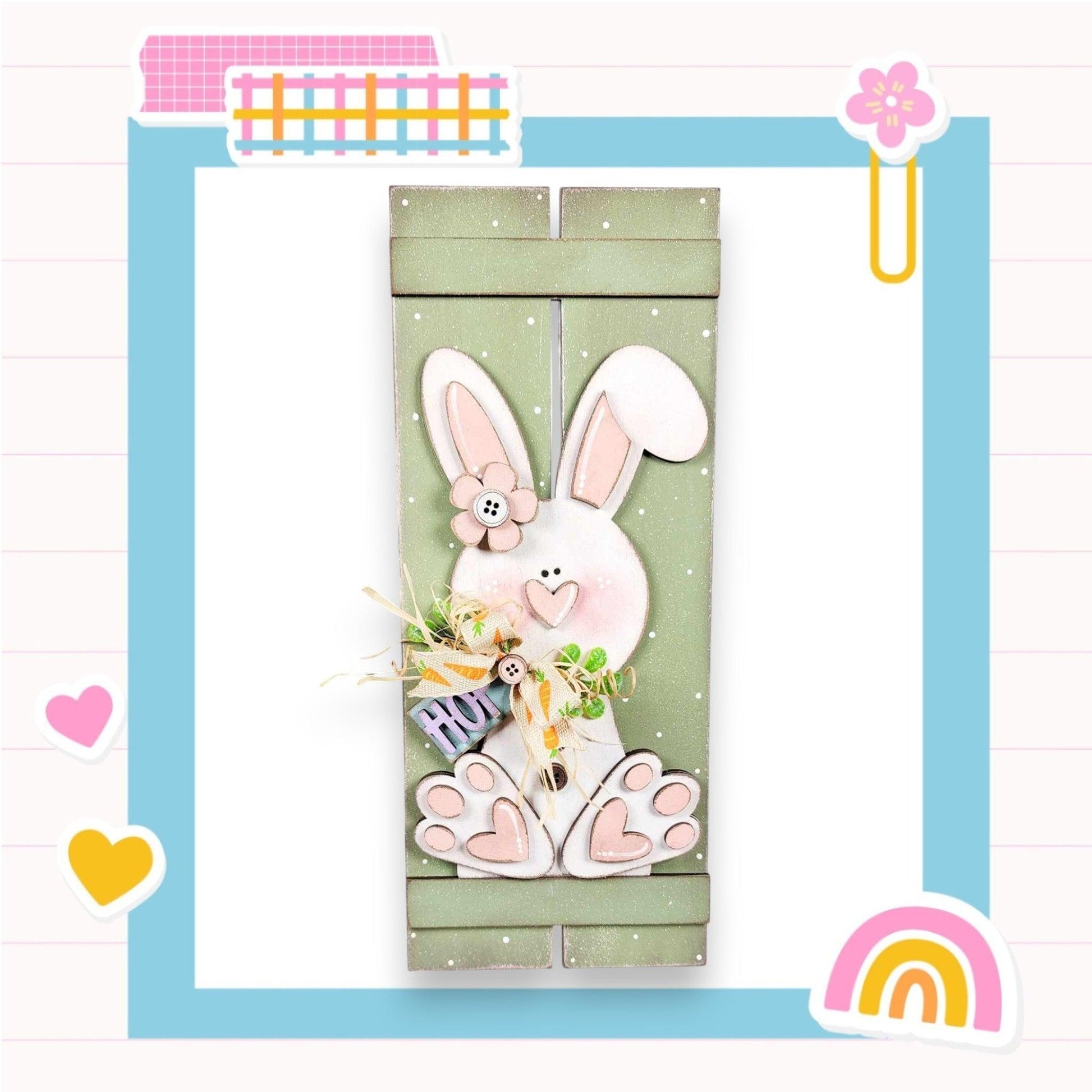 a card with a picture of a bunny holding a basket of flowers