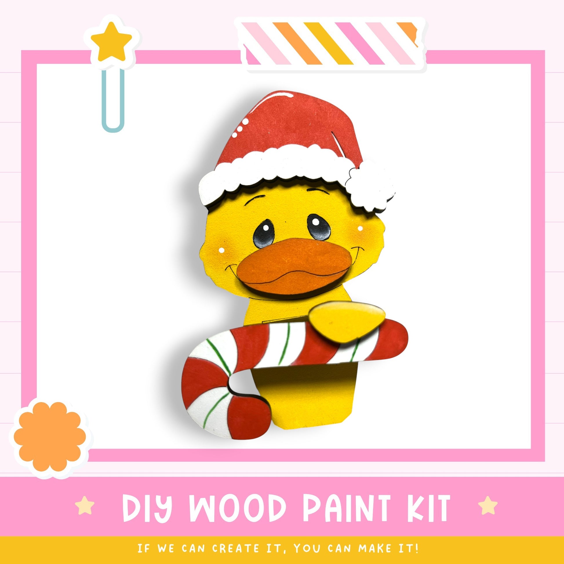 A cheerful yellow duck wearing a Santa hat and holding a candy cane, with a pink and white striped border and a star decoration.