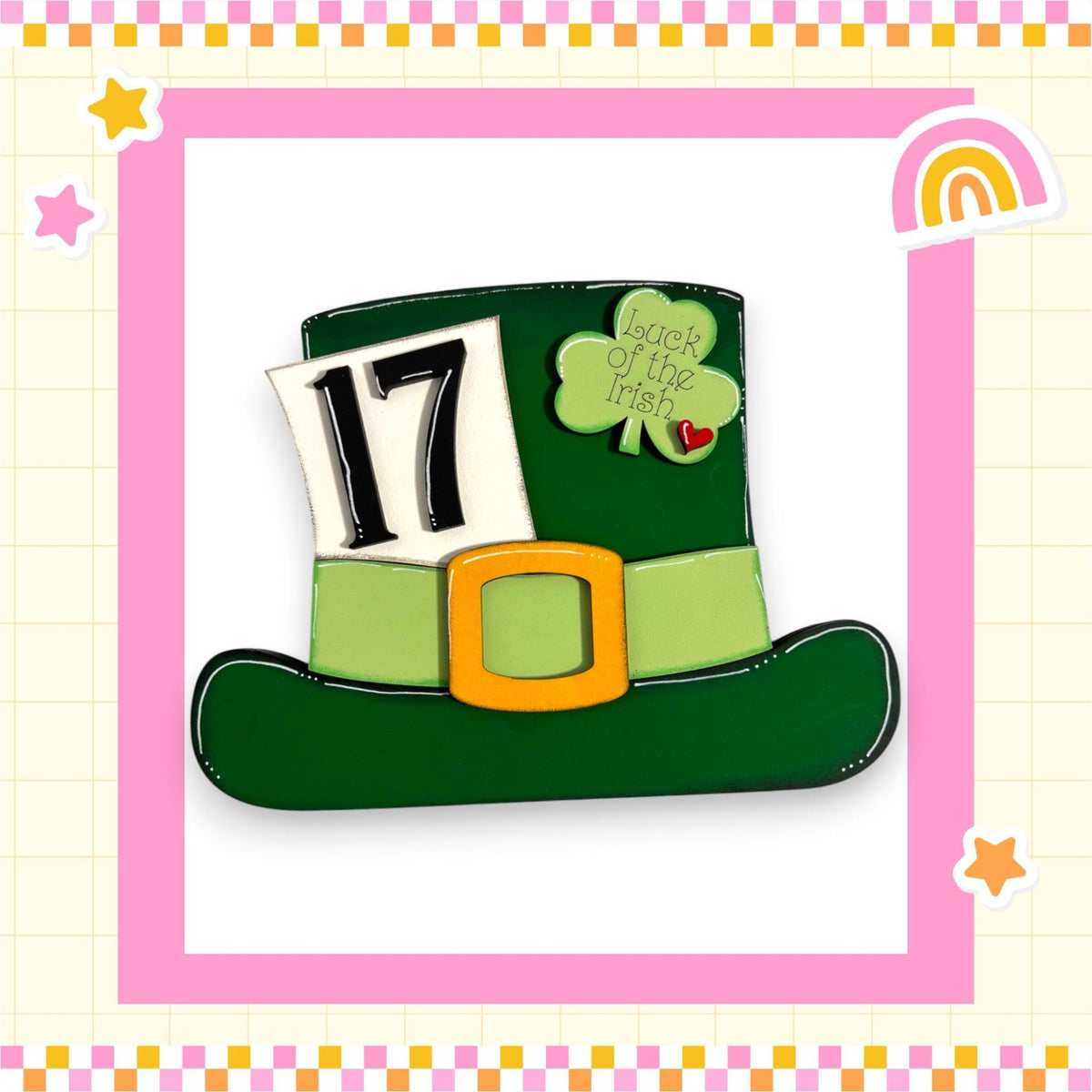 a st patrick's day hat with a rainbow in the background