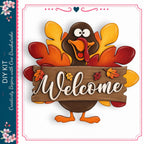 A wooden sign with a turkey holding a wooden sign that says "Welcome" in front of a colorful autumn backdrop.