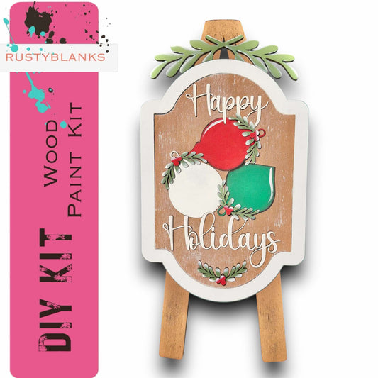 a wooden sign that says happy holidays on it