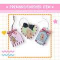 a set of three handmade christmas ornaments