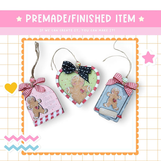 a set of three handmade christmas ornaments