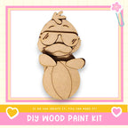 a wooden cutout of a cartoon character