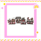 A group of four gingerbread houses, each with unique designs and decorations, arranged in a row within a pink and yellow frame.