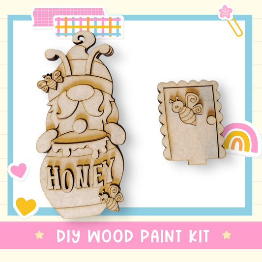 a wooden cutout of a honey jar and a picture frame