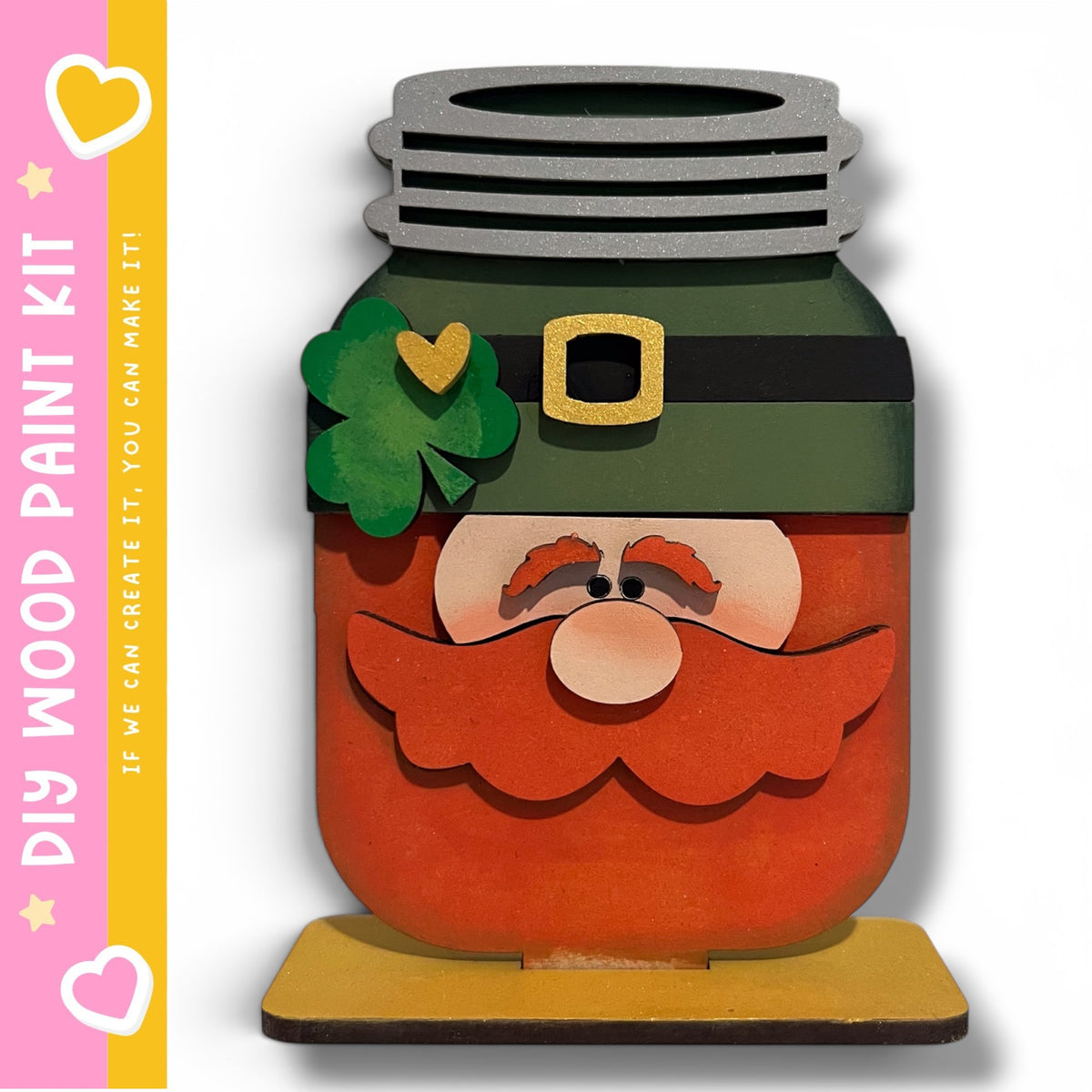 A whimsical, hand-painted jar with a leprechaun face design, including a green shamrock, a gold belt, and a red beard.