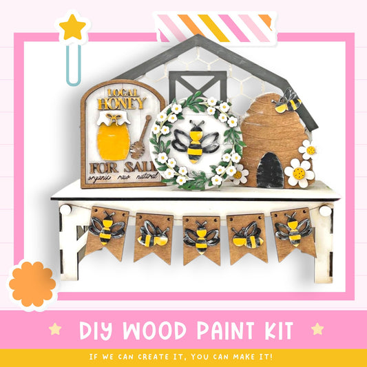 a picture of a wooden paint kit with flowers and bees