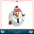 A snowman ornament with a red and white striped hat, holding a snowman ball, and the text "Snowball Fight!" is displayed against a white background.